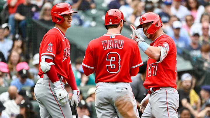 Jun 19, 2022; Seattle, Washington, USA; Los Angeles Angels center fielder Mike Trout (27) and right