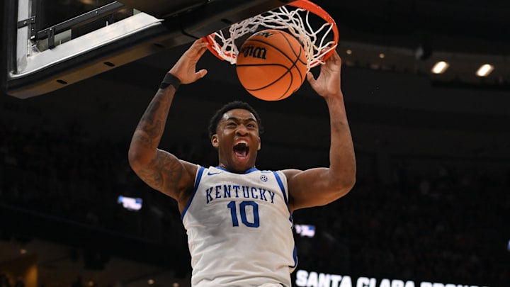 Mar 20, 2026; St. Louis, MO, USA; Kentucky Wildcats forward Brandon Garrison (10) dunks the ball against the Santa Clara Broncos during the overtime period of a first round game of the men's 2026 NCAA Tournament at Enterprise Center. Mandatory Credit: Jeff Curry-Imagn Images