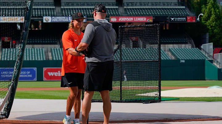 Jul 27, 2022; Baltimore, Maryland, USA; Baltimore Orioles number one draft pick Jackson Holliday speaks with manager Brandon Hyde (18) during batting practice before game against the Tampa Bay Rays at Oriole Park at Camden Yards. Jul 27, 2022; Baltimore, Maryland, USA; Baltimore Orioles number one draft pick Jackson Holliday speaks with manager Brandon Hyde (18) during batting practice before game against the Tampa Bay Rays at Oriole Park at Camden Yards.