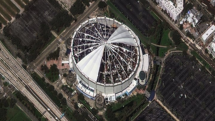 The roof of Tropicana Field, home of the Tampa Bay Rays MLB team, was torn off by Hurricane Milton's powerful winds. Satellite imagery from Maxar shows the destruction on Oct. 10, 2024. Prior to landfall, the stadium was converted into a base camp for emergency responders.
