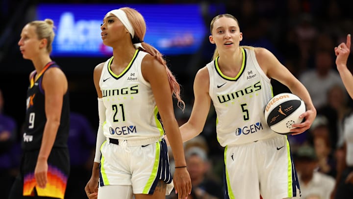 Jun 11, 2025; Phoenix, Arizona, USA; Dallas Wings guard DiJonai Carrington (21) with Paige Bueckers (5) against the Phoenix Mercury at PHX Arena. Mandatory Credit: Mark J. Rebilas-Imagn Images