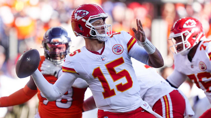 Nov 16, 2025; Denver, Colorado, USA;  Kansas City Chiefs quarterback Patrick Mahomes (15) throws a pass during the first quarter of the game against the Denver Broncos at Empower Field at Mile High. Mandatory Credit: Ron Chenoy-Imagn Images