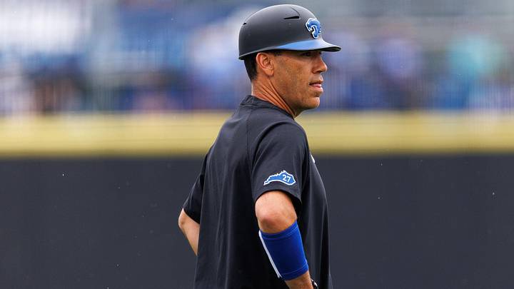 Jun 1, 2024; Lexington, KY, USA; Kentucky Wildcats head coach Nick Mingione stands on the field before a game against the Illinois Fighting Illini at Kentucky Proud Park. Mandatory Credit: Jordan Prather-Imagn Images