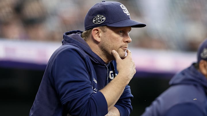 Sep 13, 2019; Denver, CO, USA; San Diego Padres manager Andy Green (14) looks on in the first inning against the Colorado Rockies at Coors Field. Mandatory Credit: Isaiah J. Downing-Imagn Images