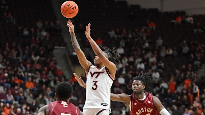 Mar 3, 2026; Blacksburg, Virginia, USA; Virginia Tech Hokies guard Ben Hammond (3) shoots a shot defended by .Boston College Eagles forward Jayden Hastings (22)  during the second half at Cassell Coliseum. Mandatory Credit: Brian Bishop-Imagn Images