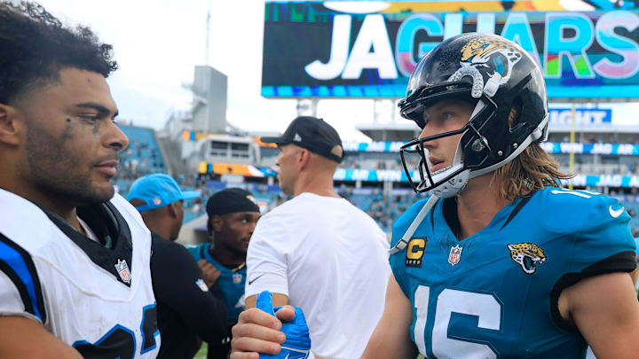 Jacksonville Jaguars quarterback Trevor Lawrence (16) greets Carolina Panthers tight end Tommy Tremble (82) after the game after the game of an NFL football matchup at EverBank Stadium, Sunday, Sept. 7, 2025 in Jacksonville, Fla. The Jaguars defeated the Panthers 26-10. [Corey Perrine/Florida Times-Union]