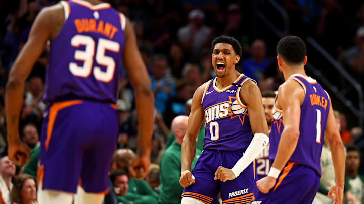 Mar 24, 2025; Phoenix, Arizona, USA; Phoenix Suns forward Ryan Dunn (0) celebrates after a play during the fourth quarter against the Milwaukee Bucks at Footprint Center.