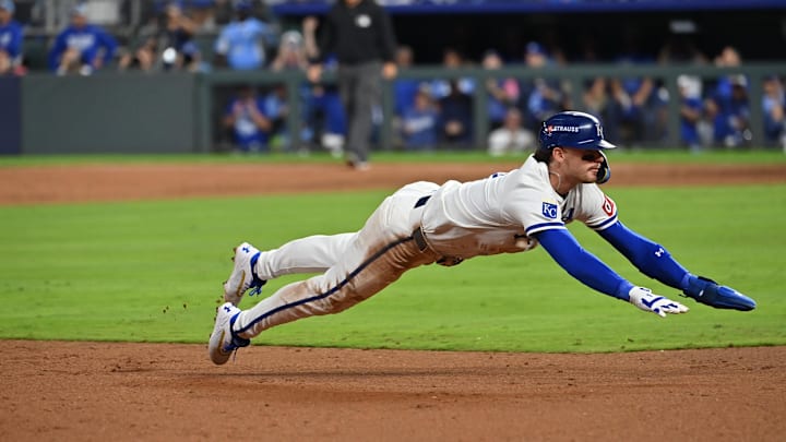 Oct 9, 2024; Kansas City, Missouri, USA; Kansas City Royals shortstop Bobby Witt Jr. (7) dices to third base in the eighth inning against the New York Yankees during game three of the NLDS for the 2024 MLB Playoffs at Kauffman Stadium. Mandatory Credit: Peter Aiken-Imagn Images Oct 9, 2024; Kansas City, Missouri, USA; Kansas City Royals shortstop Bobby Witt Jr. (7) dices to third base in the eighth inning against the New York Yankees during game three of the NLDS for the 2024 MLB Playoffs at Kauffman Stadium. Mandatory Credit: Peter Aiken-Imagn Images