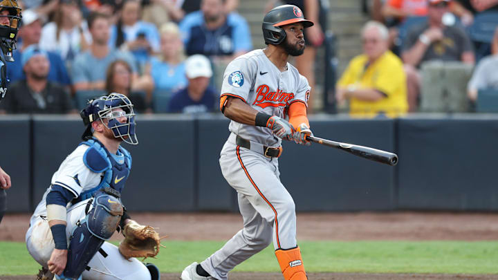 Jun 18, 2025; Tampa, Florida, USA; Baltimore Orioles center fielder Cedric Mullins (31) hits a home run against the Tampa Bay Rays in the second inning at George M. Steinbrenner Field.