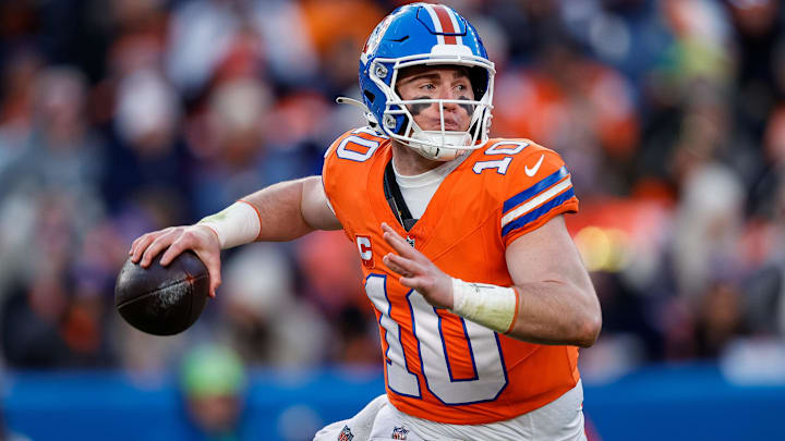 Jan 5, 2025; Denver, Colorado, USA; Denver Broncos quarterback Bo Nix (10) looks to pass in the third quarter against the Kansas City Chiefs at Empower Field at Mile High. Mandatory Credit: Isaiah J. Downing-Imagn Images Jan 5, 2025; Denver, Colorado, USA; Denver Broncos quarterback Bo Nix (10) looks to pass in the third quarter against the Kansas City Chiefs at Empower Field at Mile High. Mandatory Credit: Isaiah J. Downing-Imagn Images