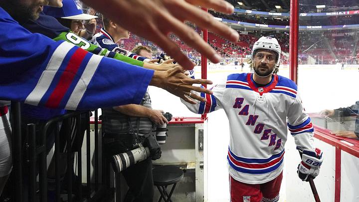 Oct 7, 2018; Raleigh, NC, USA;  New York Rangers right wing Mats Zuccarello (36) goes past the fans before the game against the Carolina Hurricanes at PNC Arena. The Carolina Hurricanes defeated the New York Rangers 8-5. Mandatory Credit: James Guillory-Imagn Images