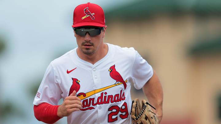 Feb 24, 2025; Jupiter, Florida, USA; St. Louis Cardinals right fielder Matt Koperniak (29) returns to the dugout against the New York Mets during the fourth inning at Roger Dean Chevrolet Stadium. Mandatory Credit: Sam Navarro-Imagn Images