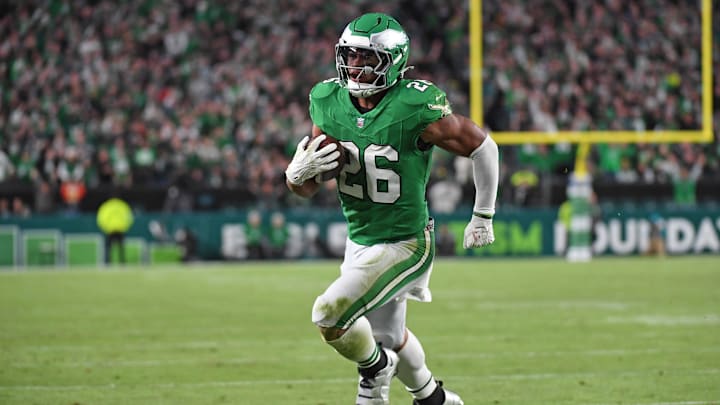 Nov 3, 2024; Philadelphia, Pennsylvania, USA; Philadelphia Eagles running back Saquon Barkley (26) score on a 19-yard touchdown run during the second quarter against the Jacksonville Jaguars at Lincoln Financial Field.