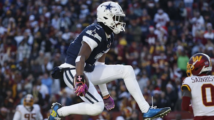 Dallas Cowboys wide receiver George Pickens celebrates after a play against the Washington Commanders.