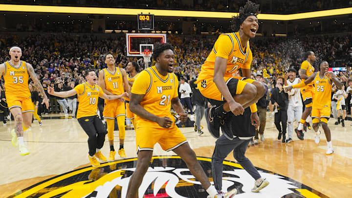 Dec 8, 2024; Columbia, Missouri, USA; The Missouri Tigers celebrate after defeating the Kansas Jayhawks at Mizzou Arena. Mandatory Credit: Jay Biggerstaff-Imagn Images
