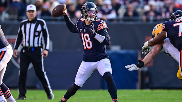 Nov 17, 2024; Chicago, Illinois, USA; Chicago Bears quarterback Caleb Williams (18) passes the ball against the Green Bay Packers during the third quarter at Soldier Field. Mandatory Credit: Daniel Bartel-Imagn Images