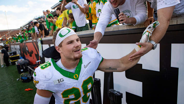 Oregon inside linebacker Bryce Boettcher celebrates with fans after the game as the Oregon State Beavers host the Oregon Ducks Saturday, Sept. 14, 2024 at Reser Stadium in Corvallis, Ore.