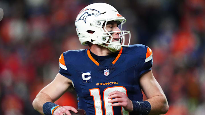 Dec 2, 2024; Denver, Colorado, USA; Denver Broncos quarterback Bo Nix (10) prepares to pass the ball in the second quarter against the Cleveland Browns at Empower Field at Mile High. Mandatory Credit: Ron Chenoy-Imagn Images