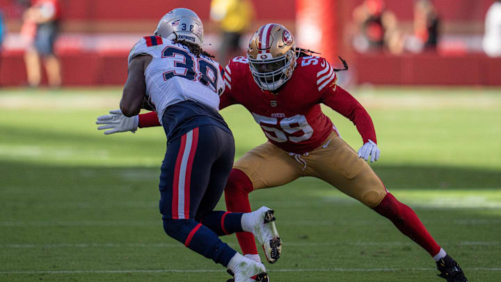 Sep 29, 2024; Santa Clara, California, USA; San Francisco 49ers linebacker De'Vondre Campbell (59) tackles New England Patriots running back Rhamondre Stevenson (38) during the fourth quarter at Levi's Stadium. Mandatory Credit: Neville E. Guard-Imagn Images Sep 29, 2024; Santa Clara, California, USA; San Francisco 49ers linebacker De'Vondre Campbell (59) tackles New England Patriots running back Rhamondre Stevenson (38) during the fourth quarter at Levi's Stadium. Mandatory Credit: Neville E. Guard-Imagn Images