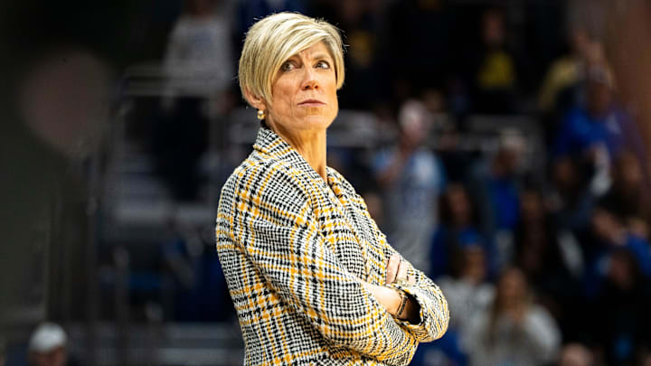Iowa head coach Jan Jensen looks on during warm ups pf the Drake vs. Iowa basketball game at Knapp Center on Sunday, Nov. 17, 2024, in Des Moines.