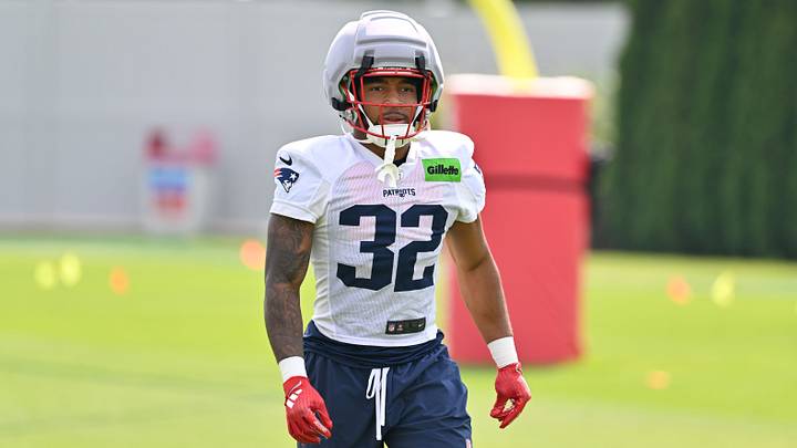 New England Patriots running back Treveyon Henderson (32) walks to practice for training camp at Gillette Stadium. Mandatory Credit: Eric Canha-Imagn Images New England Patriots running back Treveyon Henderson (32) walks to practice for training camp at Gillette Stadium. Mandatory Credit: Eric Canha-Imagn Images