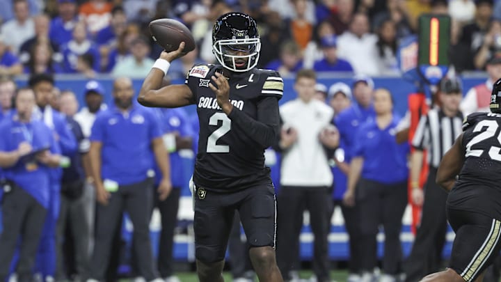 Dec 28, 2024; San Antonio, TX, USA; Colorado Buffaloes quarterback Shedeur Sanders (2) attempts a pass during the first quarter against the Brigham Young Cougars at Alamodome. Dec 28, 2024; San Antonio, TX, USA; Colorado Buffaloes quarterback Shedeur Sanders (2) attempts a pass during the first quarter against the Brigham Young Cougars at Alamodome.