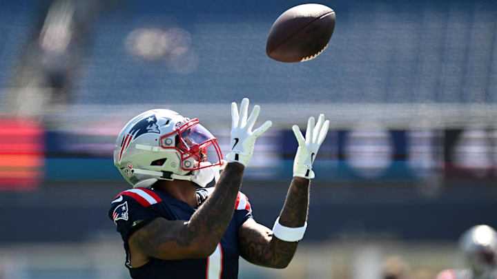 Sep 15, 2024; Foxborough, Massachusetts, USA; New England Patriots wide receiver Ja'Lynn Polk (1) catches the ball during warmups before a game against the Seattle Seahawks at Gillette Stadium. Mandatory Credit: Brian Fluharty-Imagn Images
