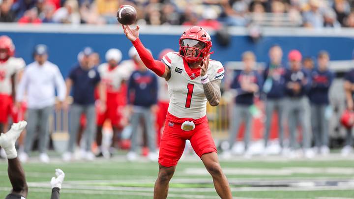 Oct 10, 2026; Morgantown, West Virginia, USA;  Arizona Wildcats quarterback Noah Fifita (1) throws a pass during the first quarter against the West Virginia Mountaineers at Milan Puskar Stadium.  Mandatory Credit: Ben Queen-Imagn Images