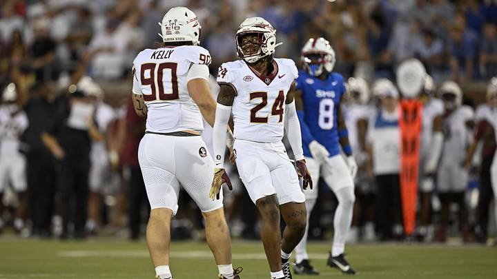 Sep 28, 2024; Dallas, Texas, USA; Florida State Seminoles defensive lineman Grady Kelly (90) and defensive back K.J. Kirkland (24) celebrate during the game between the Southern Methodist Mustangs and the Florida State Seminoles at Gerald J. Ford Stadium. Mandatory Credit: Jerome Miron-Imagn Images Sep 28, 2024; Dallas, Texas, USA; Florida State Seminoles defensive lineman Grady Kelly (90) and defensive back K.J. Kirkland (24) celebrate during the game between the Southern Methodist Mustangs and the Florida State Seminoles at Gerald J. Ford Stadium. Mandatory Credit: Jerome Miron-Imagn Images