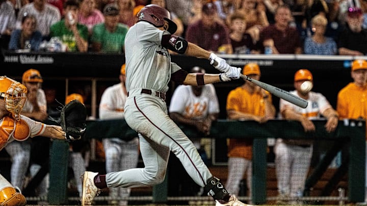 Texas A&M Aggies second baseman Kaeden Kent (3) hits a two run home run against the Tennessee Volunteers during the seventh inning at Charles Schwab Field Omaha.