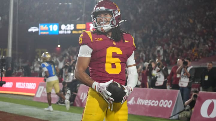 USC wide receiver Makai Lemon (6) celebrates after catching a 32-yard touchdown pass against the UCLA Bruins in the second half at United Airlines Field at Los Angeles Memorial Coliseum. USC wide receiver Makai Lemon (6) celebrates after catching a 32-yard touchdown pass against the UCLA Bruins in the second half at United Airlines Field at Los Angeles Memorial Coliseum.