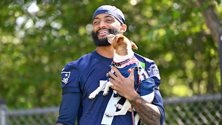 Jul 23, 2025; Foxborough, MA, USA; New England Patriots cornerback Carlton Davis III (7) walks to the practice field for training camp at Gillette Stadium. Mandatory Credit: Eric Canha-Imagn Images