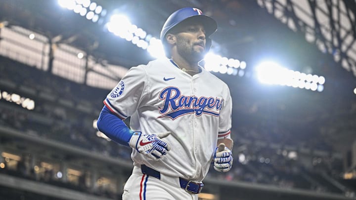 Jun 3, 2024; Arlington, Texas, USA; Texas Rangers second baseman Marcus Semien (2) comes off the field after he hits a leadoff home run against the Detroit Tigers during the first inning at Globe Life Field. Mandatory Credit: Jerome Miron-USA TODAY Sports