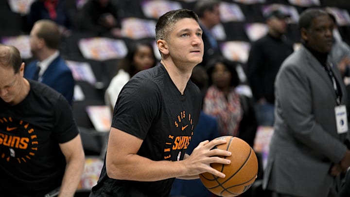 Mar 9, 2025; Dallas, Texas, USA; Phoenix Suns guard Grayson Allen (8) warms up before the game between the Dallas Mavericks and the Phoenix Suns at the American Airlines Center. Mandatory Credit: Jerome Miron-Imagn Images