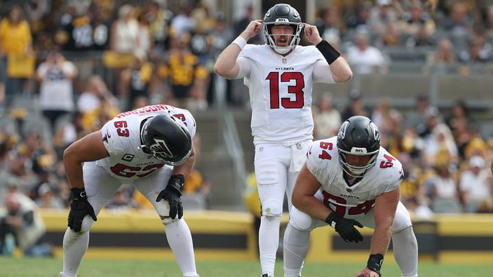 Sep 13, 2026; Pittsburgh, Pennsylvania, USA;  Atlanta Falcons quarterback Cooper Rush (13) calls an audible behind guard Chris Lindstrom (63) and offensive line Ryan Neuzil (64) during the second quarter against the Pittsburgh Steelers at Acrisure Stadium.  Mandatory Credit: Charles LeClaire-Imagn Images
