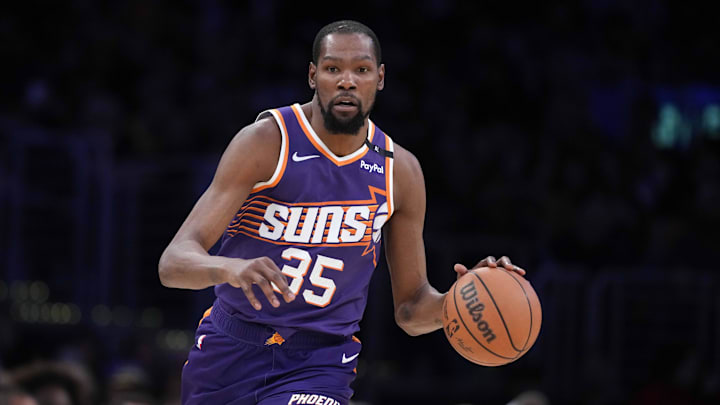 Mar 16, 2025; Los Angeles, California, USA; Phoenix Suns forward Kevin Durant (35) dribbles the ball against the Los Angeles Lakers in the second half at Crypto.com Arena. Mandatory Credit: Kirby Lee-Imagn Images
