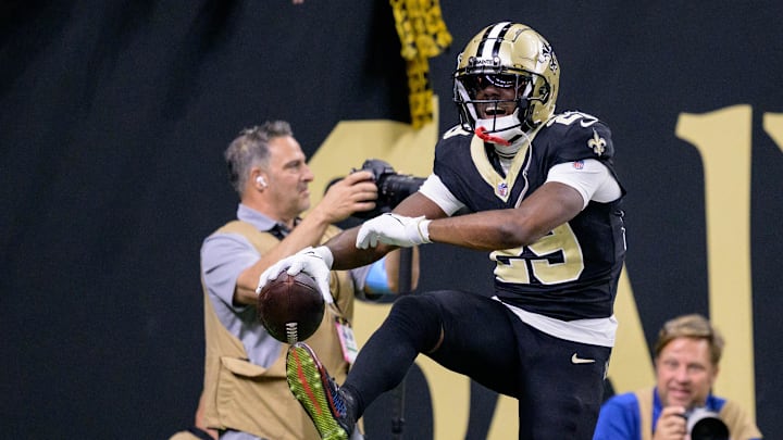 Oct 13, 2024; New Orleans, Louisiana, USA; New Orleans Saints cornerback Paulson Adebo (29) celebrates an interception during the second quarter against the Tampa Bay Buccaneers at Caesars Superdome. 