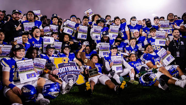 Santa Margarita poses after winning the CIF State Open Division championship with a 47-13 win over De La Salle at Saddleback College. Santa Margarita poses after winning the CIF State Open Division championship with a 47-13 win over De La Salle at Saddleback College.