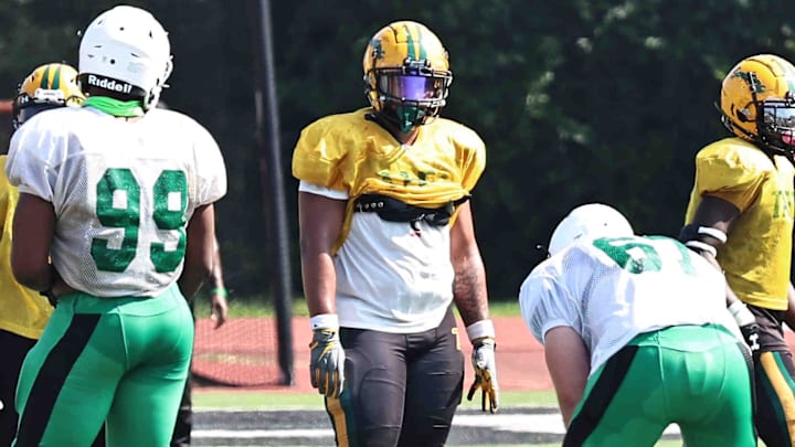 Taft defensive lineman Drayden Pavey lines up during the Senators' scrimmage at Anderson, Friday, Aug. 4, 2023.