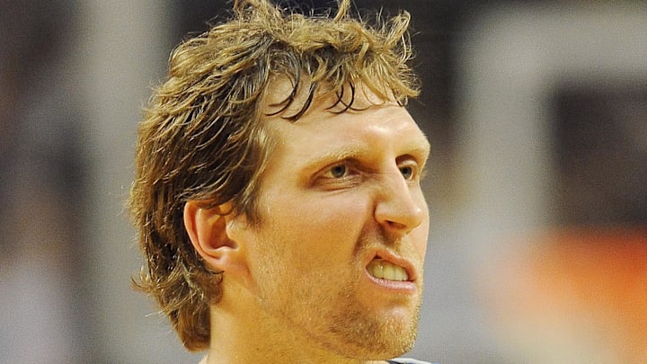 Dallas Mavericks power forward Dirk Nowitzki reacts as he looks over at the bench after scoring.