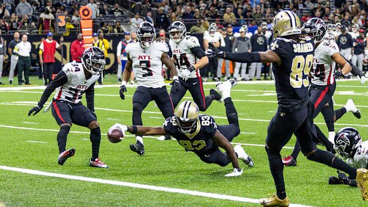 Dec 18, 2022; New Orleans, Louisiana, USA;  New Orleans Saints tight end Juwan Johnson (83) dives in