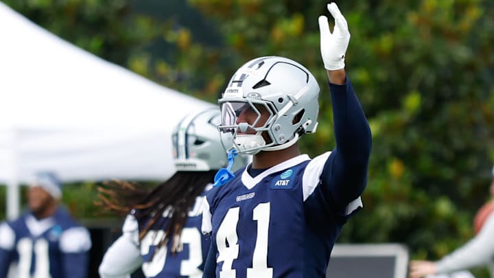 Jun 10, 2025; Arlington, TX, USA;  Dallas Cowboys defensive end Donovan Ezeiruaku (41) goes through a drill during practice at the Ford Center at the Star Training Facility in Frisco, Texas. Mandatory Credit: Chris Jones-Imagn Images