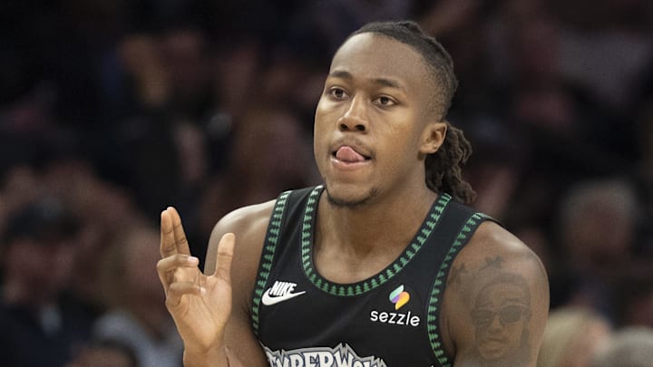 Mar 5, 2026; Minneapolis, Minnesota, USA; Minnesota Timberwolves guard Ayo Dosunmu (13) celebrates making a shot against the Toronto Raptors in the second half at Target Center. Mandatory Credit: Jesse Johnson-Imagn Images