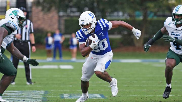Sep 5, 2026; Durham, North Carolina, USA; Duke Blue Devils running back Nate Sheppard (20) runs the ball against the Tulane Green Wave during the second quarter at Wallace Wade Stadium. Mandatory Credit: Zachary Taft-Imagn Images Sep 5, 2026; Durham, North Carolina, USA; Duke Blue Devils running back Nate Sheppard (20) runs the ball against the Tulane Green Wave during the second quarter at Wallace Wade Stadium. Mandatory Credit: Zachary Taft-Imagn Images