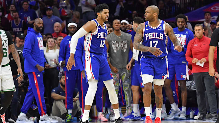 May 7, 2023; Philadelphia, Pennsylvania, USA; Philadelphia 76ers forward P.J. Tucker (17) reacts with forward Tobias Harris (12) after making a basket and getting fouled against the Boston Celtics during the fourth quarter of game four of the 2023 NBA playoffs at Wells Fargo Center. Mandatory Credit: Eric Hartline-Imagn Images