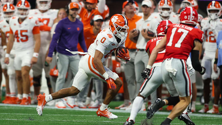 Aug 31, 2024; Atlanta, Georgia, USA; Clemson Tigers wide receiver Antonio Williams (0) runs after a catch against the Georgia Bulldogs in the first quarter at Mercedes-Benz Stadium. 