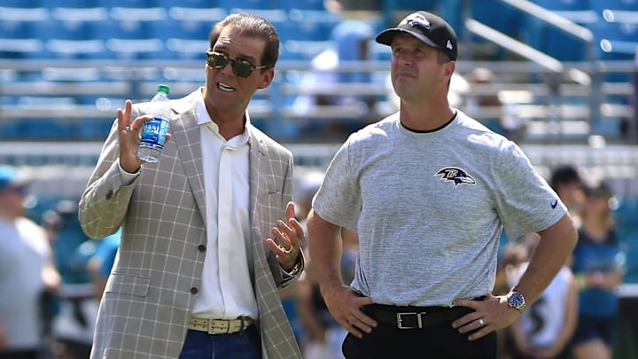 Sep 25, 2016; Jacksonville, FL, USA; Baltimore Ravens head coach John Harbaugh (R) talks to team owner Steve Bisciotti (L) prior to their game against the Jacksonville Jaguars at EverBank Field. Mandatory Credit: Reinhold Matay-Imagn Images