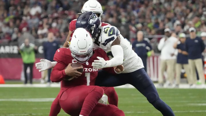 Arizona Cardinals quarterback Kyler Murray (1) is sacked by Seattle Seahawks cornerback Devon Witherspoon (21) during the third quarter at State Farm Stadium in Glendale on Jan. 7, 2024. Arizona Cardinals quarterback Kyler Murray (1) is sacked by Seattle Seahawks cornerback Devon Witherspoon (21) during the third quarter at State Farm Stadium in Glendale on Jan. 7, 2024.