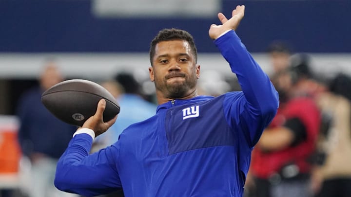 Sep 14, 2025; Arlington, Texas, USA; New York Giants quarterback Russell Wilson (3) warms up before the game against the Dallas Cowboys at AT&T Stadium. 