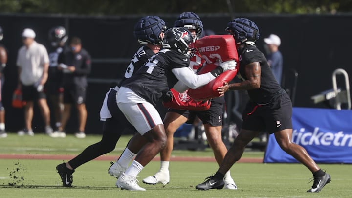 Jul 24, 2025; Houston, TX, USA; Houston Texans tight end Dalton Schultz (86) and tackle Cam Robinson (74) and tight end Brevin Jordan (9) during training camp at Houston Methodist Training Center. Mandatory Credit: Troy Taormina-Imagn Images
